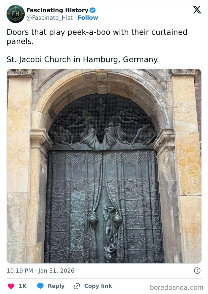 Ornate historical church doors at St. Jacobi Hamburg showing advanced craftsmanship and detailed sculptural panels.