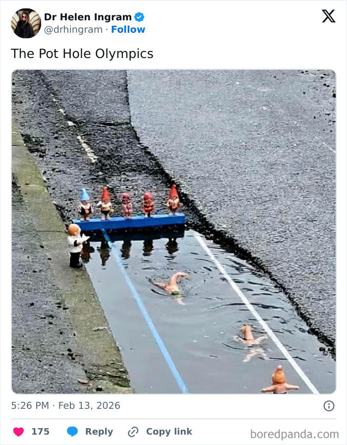 Miniature gnomes and toy swimmers set up for a humorous pothole Olympics in the UK street puddle.