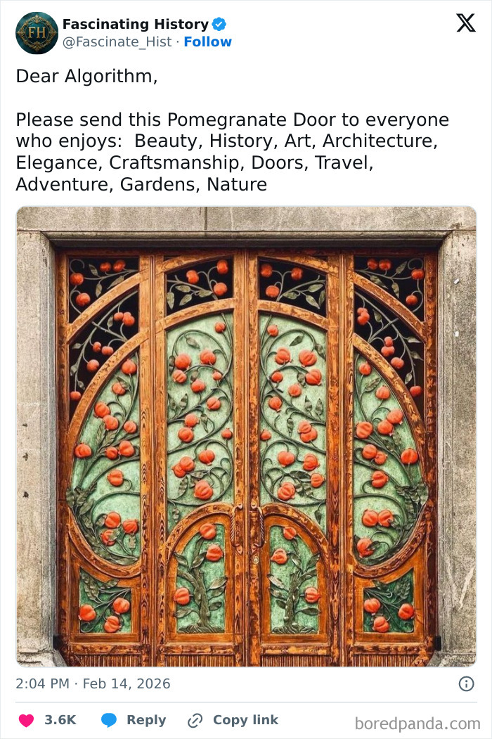 Ornate historical door with intricate pomegranate carvings showcasing advanced craftsmanship and artistic elegance from the past.