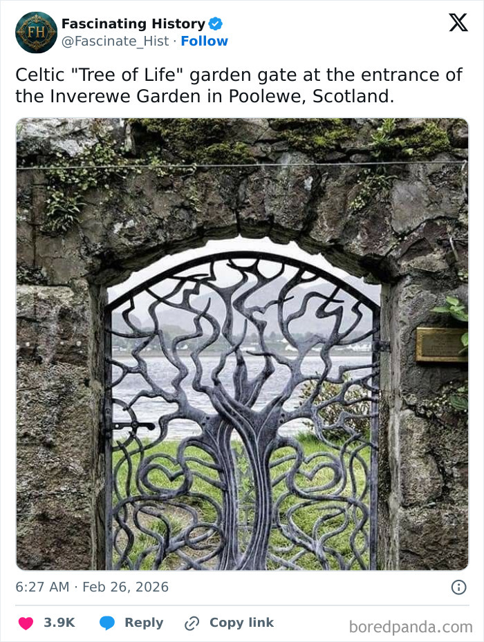 Celtic Tree of Life garden gate made of intricate metalwork, an interesting historical treasure showing past craftsmanship.