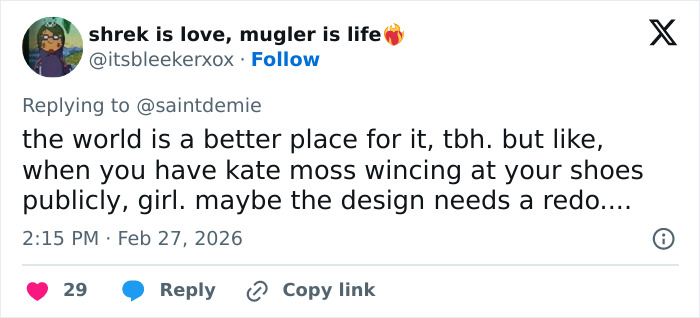 Kate Moss wearing a revealing dress at the Gucci show, sparking divided reactions from fans and fashion critics.