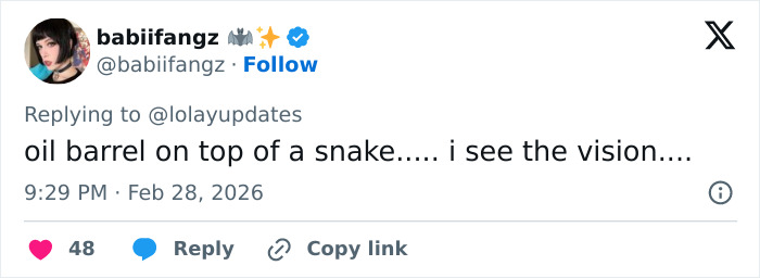 Tweet screenshot showing a fan humorously comparing Lola Young's outfit to an oil container on the Brit Awards 2026 red carpet. Tweet screenshot showing a fan humorously comparing Lola Young's outfit to an oil container on the Brit Awards 2026 red carpet.