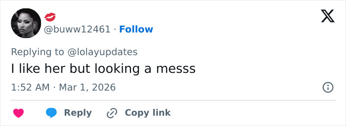 Screenshot of a Twitter reply commenting on Lola Young's oil container outfit at the Brit Awards 2026 red carpet. Screenshot of a Twitter reply commenting on Lola Young's oil container outfit at the Brit Awards 2026 red carpet.