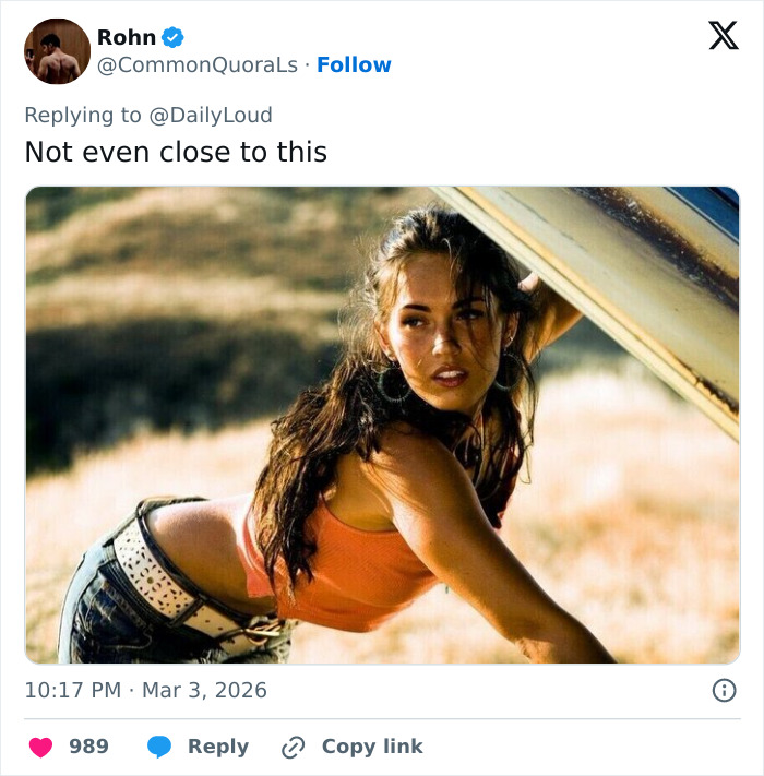 Megan Fox posing outdoors in an orange top and jeans, sparking rumors about a possible BBL transformation. Megan Fox posing outdoors in an orange top and jeans, sparking rumors about a possible BBL transformation.