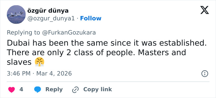 Tweet discussing the harsh reality of Dubai's labor camps, highlighting social class division and labor conditions.