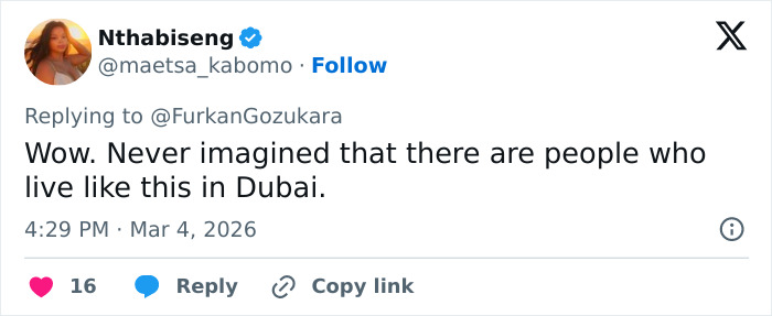 Tweet by Nthabiseng expressing shock about living conditions in Dubai, highlighting the harsh reality of Dubai labor camps.