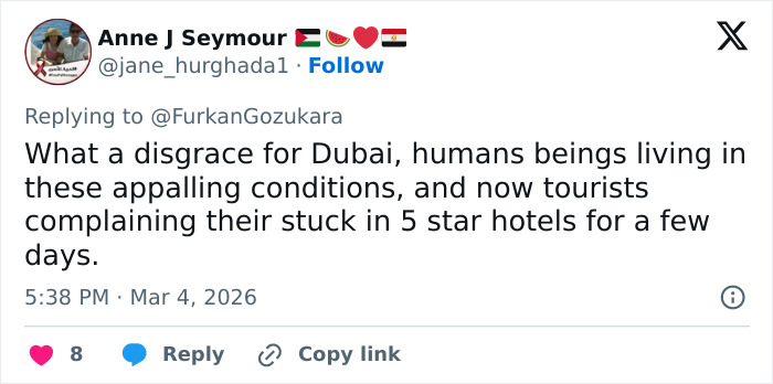 Tweet criticizing harsh conditions in Dubai's labor camps, highlighting human rights and viral video exposure.
