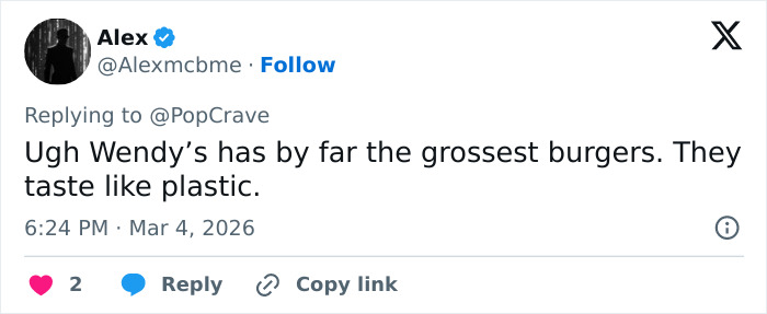 Screenshot of a tweet criticizing Wendy&rsquo;s burgers as the grossest and tasting like plastic amid burger battle discussions.
