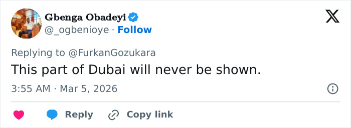Screenshot of a tweet discussing the hidden reality of Dubai labor camps and their exclusion from public view.