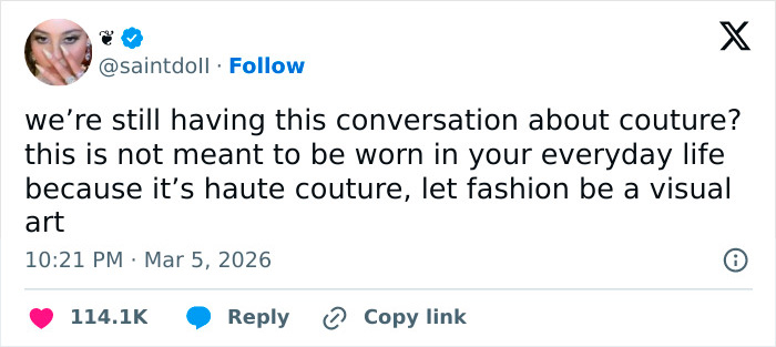 Screenshot of a tweet discussing haute couture fashion and its role as visual art, related to Paris Fashion Week outfits.