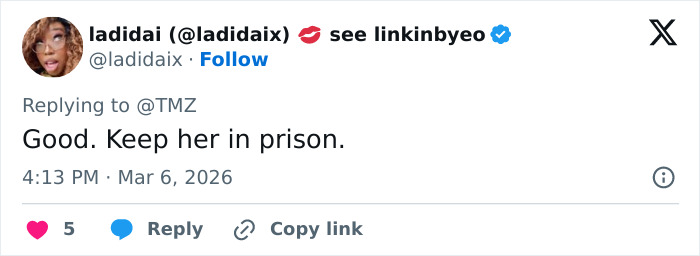 Former Mayor Misty Roberts’ mugshot with religious symbols visible, drawing public attention and raising eyebrows.