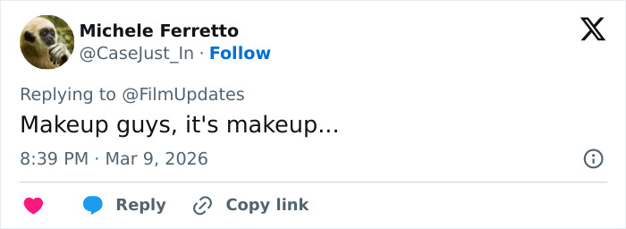 Tweet discussing makeup in response to Margot Robbie&rsquo;s Paris Fashion Week appearance sparking mixed reactions.
