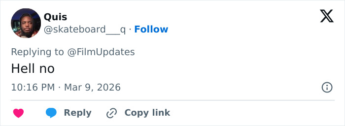 User Quis replies Hell no to FilmUpdates on Twitter, reflecting mixed reactions to Margot Robbie&rsquo;s Paris Fashion Week appearance.