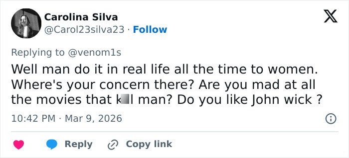 Screenshot of a Twitter reply discussing real-life violence, related to fans noticing disturbing patterns in Sabrina Carpenter music videos.