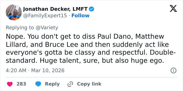 Screenshot of a tweet showing fan reactions to Quentin Tarantino&rsquo;s scathing response involving Rosanna Arquette.