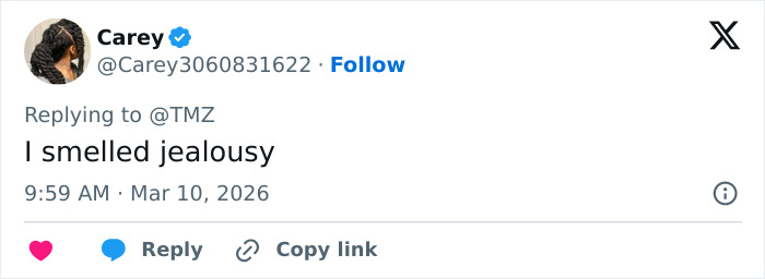 Screenshot of a Twitter reply expressing jealousy in response to a discussion about Jack White and Taylor Swift backlash.