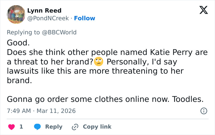 Twitter reply by Lynn Reed discussing the legal battle involving Katy Perry and issues with brand threats.