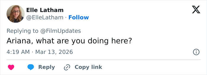 Twitter reply from Elle Latham questioning Ariana's presence in a conversation about Demi Moore's SXSW appearance backlash.