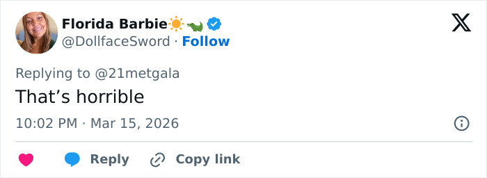 Screenshot of a tweet reacting to Demi Moore&rsquo;s Oscars look with a comment calling it scary and horrible.