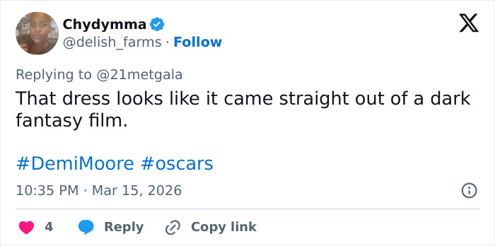 Tweet showing a user describing Demi Moore&rsquo;s Oscars look as scary, like a dark fantasy dress.