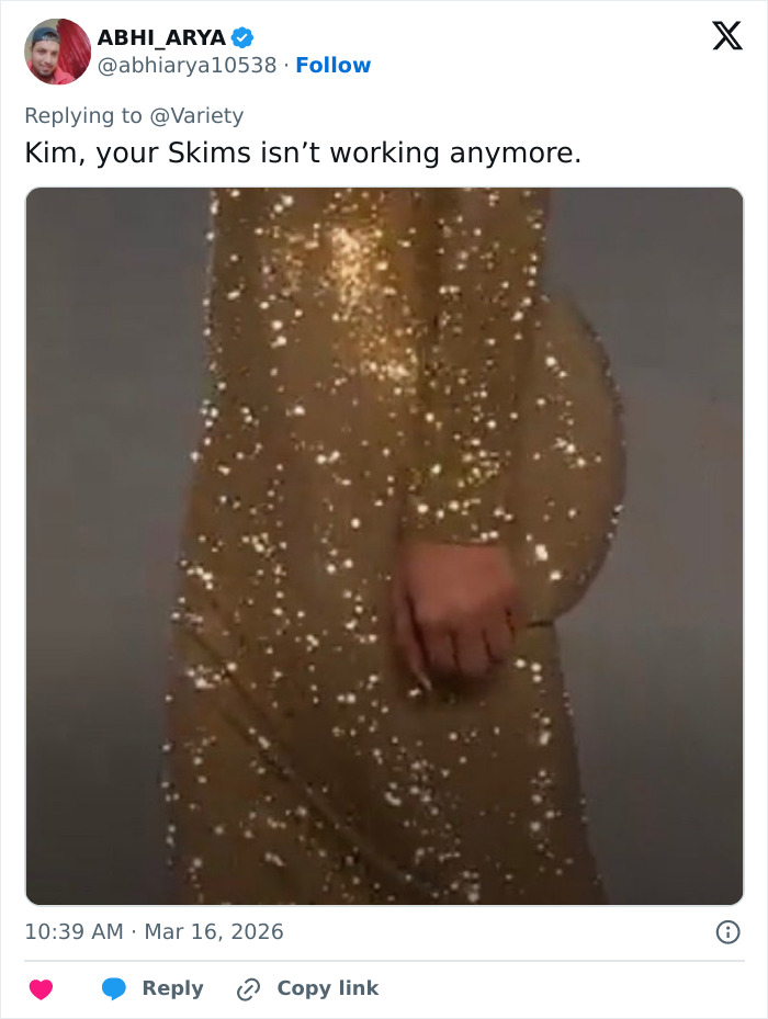 Kim Kardashian wearing a sparkling gold dress at Oscars party, fans reacting to odd details and more work done speculation.