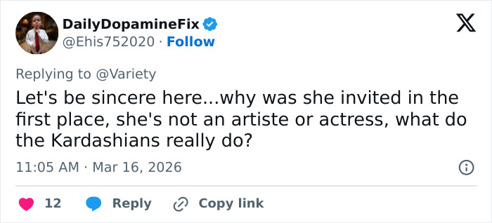 Tweet from DailyDopamineFix questioning Kardashian’s Oscars party look and what the Kardashians really do, sparking fan reactions.