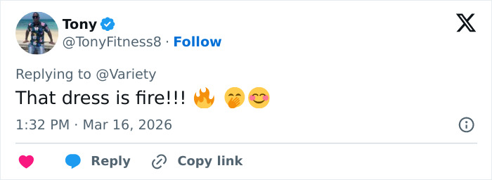 Kim Kardashian at Oscars party wearing a striking outfit, prompting fans to react wildly to her look’s odd details.