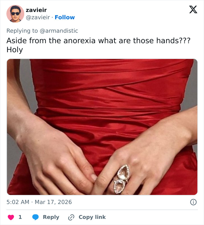 Close-up of Maude Apatow’s hands in a red dress showing a disturbing detail noticed by people at Oscars party.