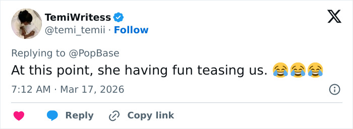 Tweet by TemiWritess replying to PopBase, commenting on Zendaya and Tom Holland marriage rumors with laughing emojis.