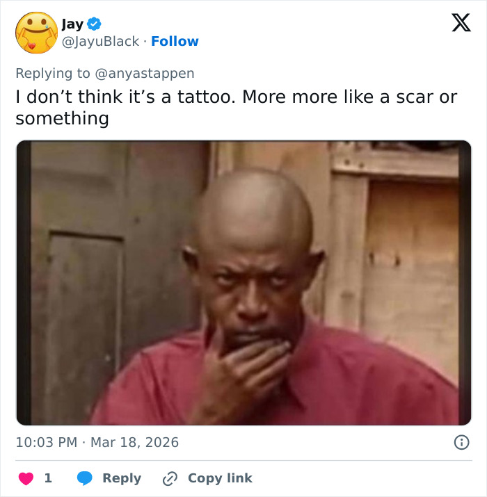 Man in red shirt looking puzzled, illustrating fans' heated debate about Anya Taylor‑Joy’s interview appearance.