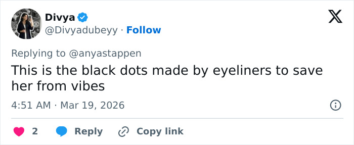 Tweet from user Divya discussing Anya Taylor-Joy’s interview appearance featuring black dots made with eyeliner sparking debate.