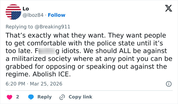 Screenshot of a Twitter reply discussing opposition to ICE and concerns about a militarized police state.