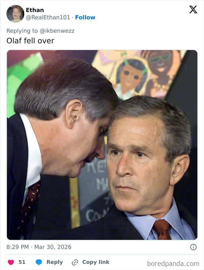 Two men in suits having a serious conversation, unrelated to Disney's animatronic Olaf collapsing incident.