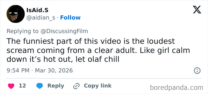 Screenshot of a Twitter reply reacting humorously to Disney’s animatronic Olaf suddenly collapsing in front of fans.