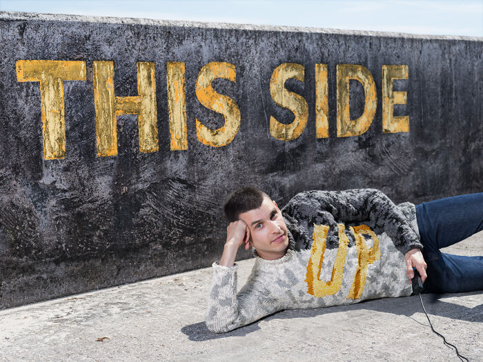 Artist Duo Creates Incredible Hand-Knitted Camouflage That Blends People Into Real Places (27 Pics)