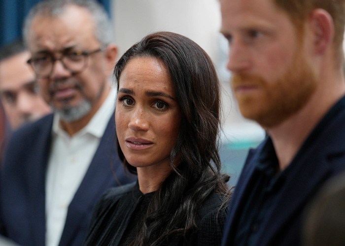 Meghan Markle and Prince Harry appear serious in a statement photo amid bombshell claims and furious public reaction.