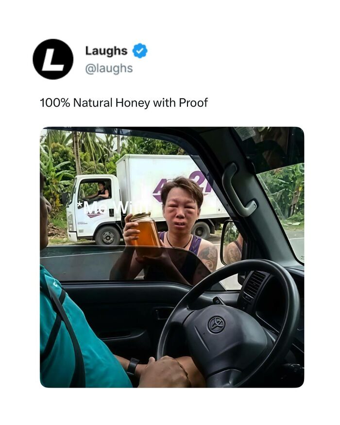 Person showing jar of honey through car window, funny meme about natural honey, humor for a break from being responsible adult.