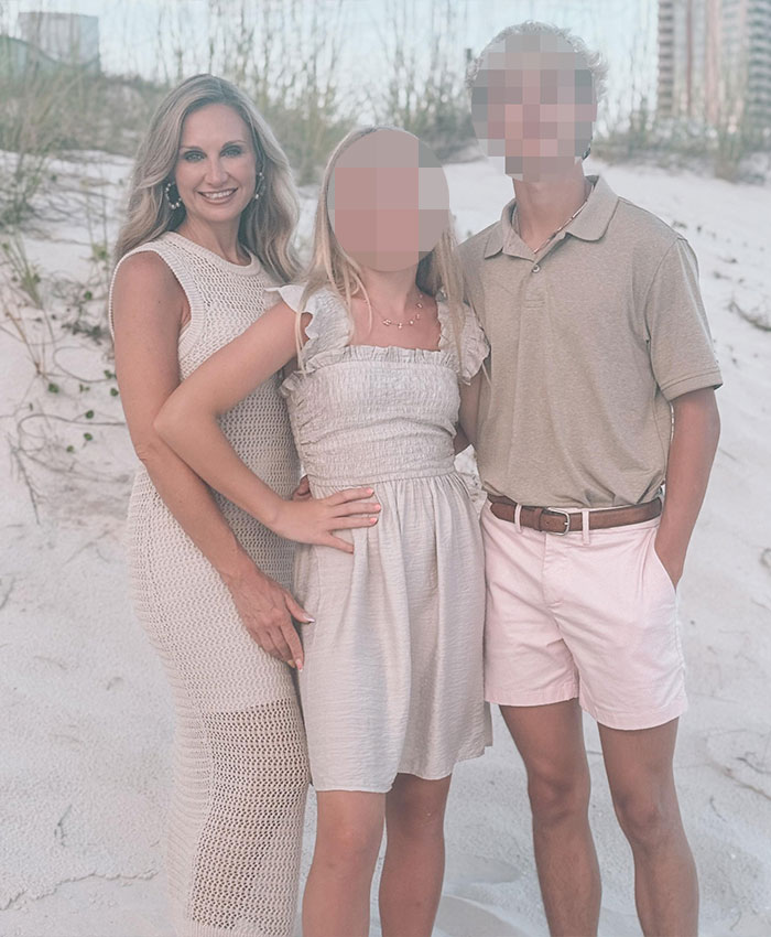 Woman posing on beach with two teenagers, related to former mayor Misty Roberts mugshot religious symbols story