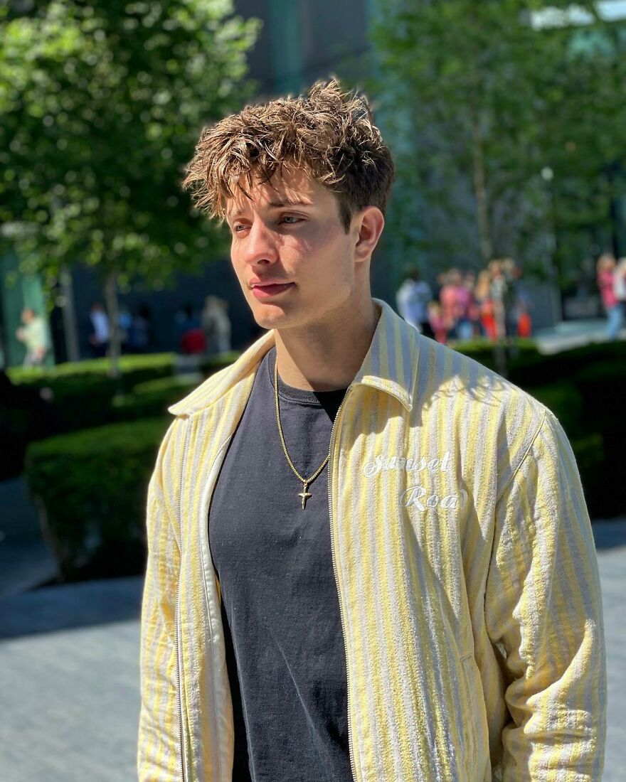 Matt Rife outdoors in casual yellow striped jacket and black shirt, addressing plastic surgery rumors in recent book. Matt Rife outdoors in casual yellow striped jacket and black shirt, addressing plastic surgery rumors in recent book.
