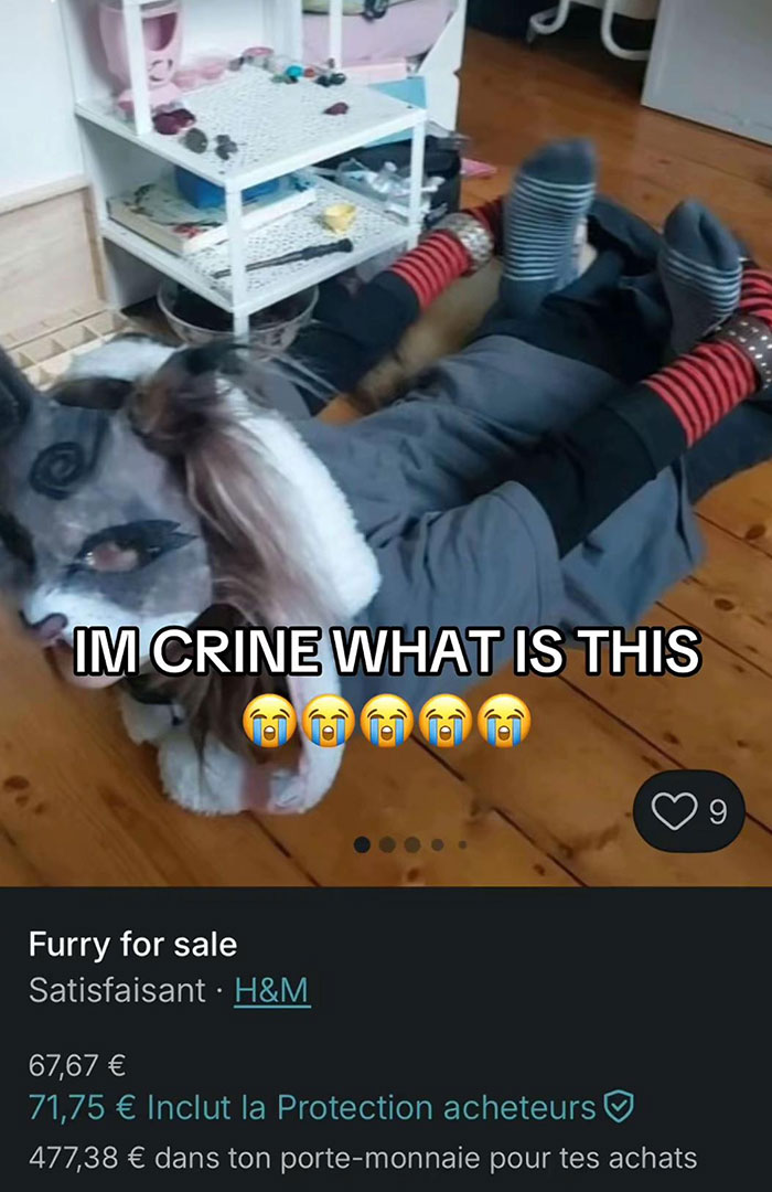 Person wearing a furry costume lying on a wooden floor, humorous Vinted listing showing unusual fashion item.