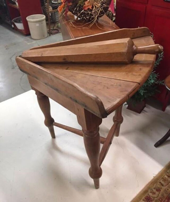 Antique wooden furniture piece and rolling pin, an example of internet solving the mystery of unidentified objects.