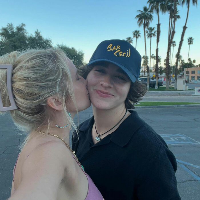 Anna Camp with partner outdoors, sharing a tender moment, highlighting age-gap romance and sexuality clarity.