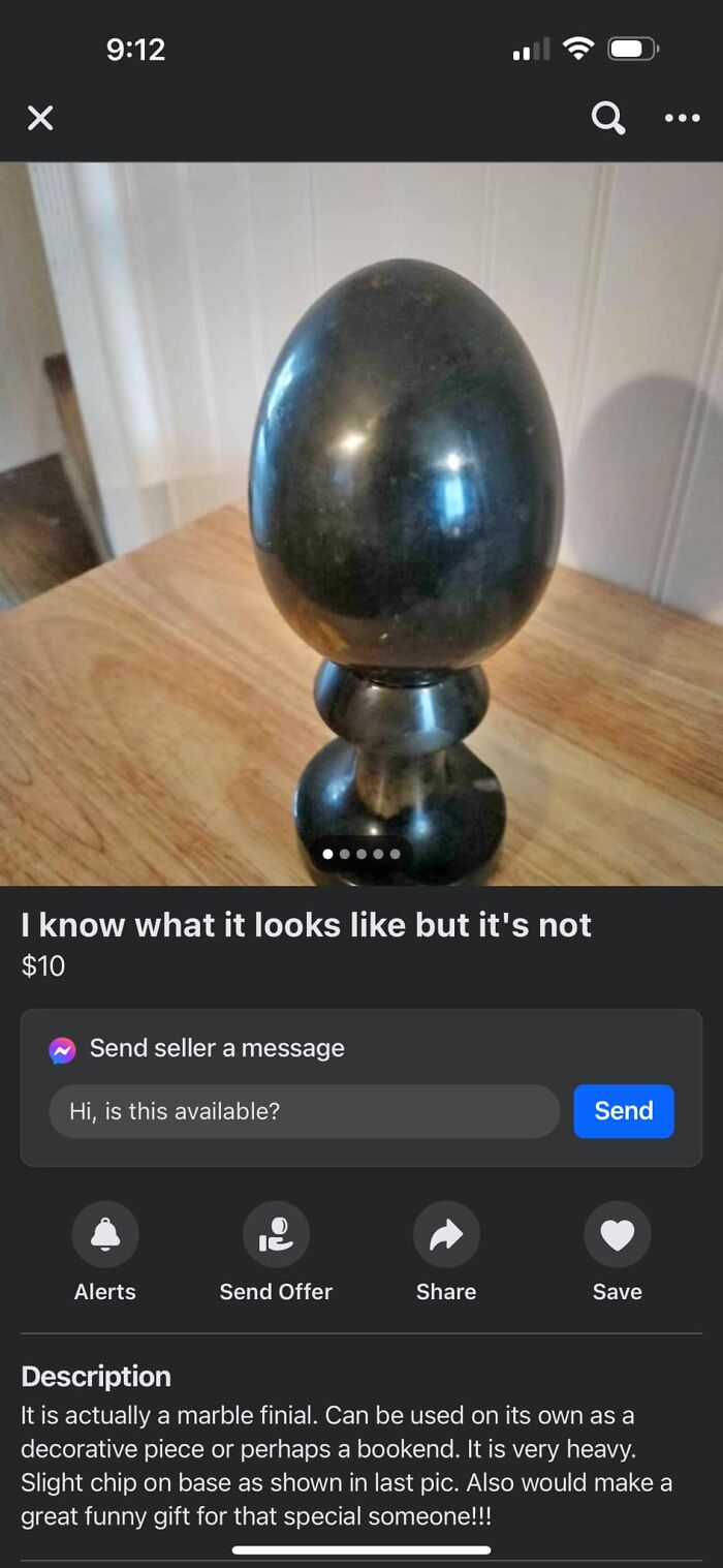 Black marble finial with a unique shape listed on Facebook Marketplace in an unusual and unhinged item collection.
