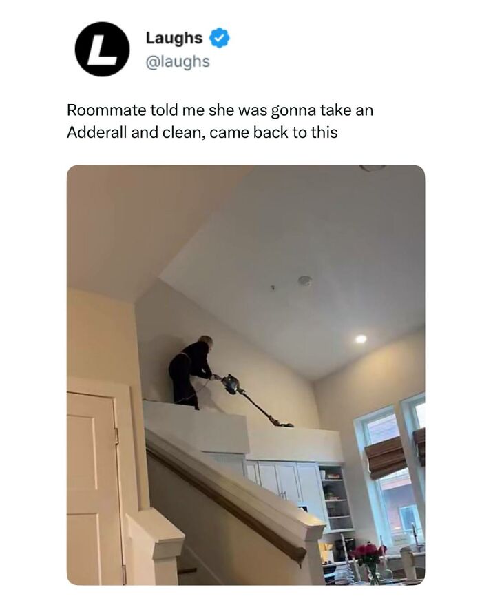 Person vacuuming high ledge in a home, showcasing a funny meme about taking a break from being a responsible adult.