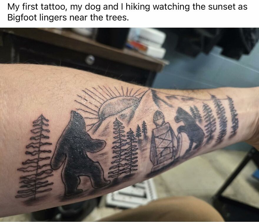 Forearm tattoo featuring Bigfoot, trees, mountains, and a hiker, showcasing a unique and questionable tattoo design.