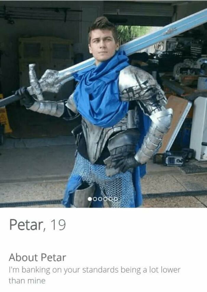 Young man in a knight costume posing with a large sword in a humorous Tinder profile making people laugh and cringe.