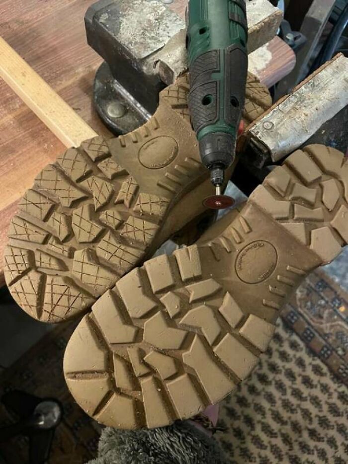 Boot soles being cleaned with a rotary tool, showcasing a genius idea to solve an annoying problem efficiently.