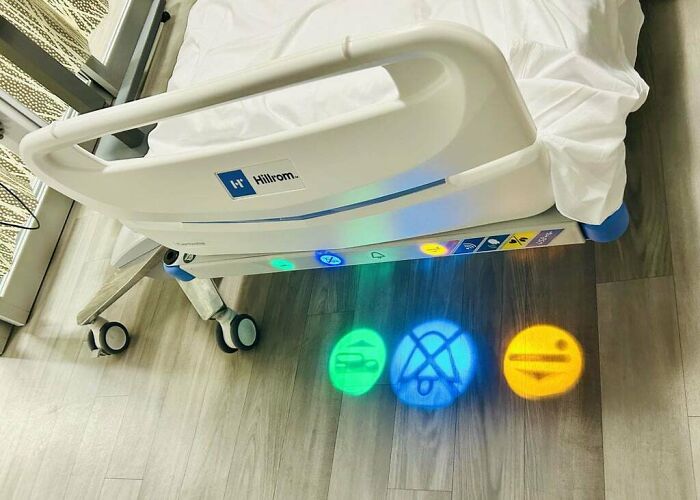 Hospital bed with colored indicator lights projected on the floor, a clever solution from genius ideas solving annoying problems.