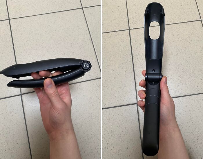 Hand holding a black unidentified object, shown folded and unfolded, for internet mystery solving of unidentified objects.