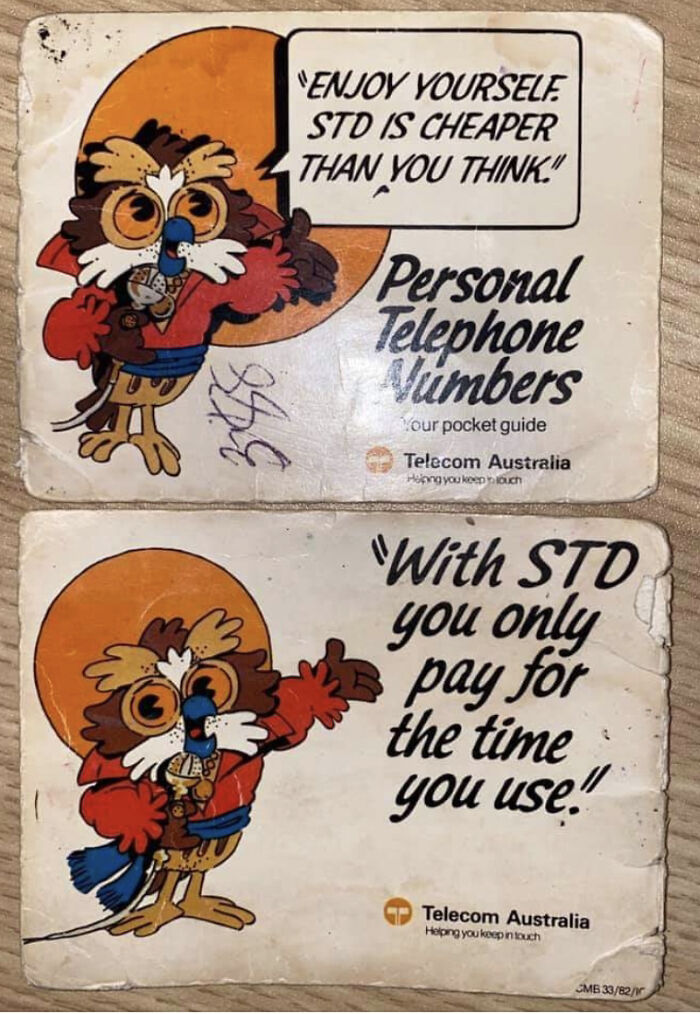 Vintage Telecom Australia STD phone guide cards with cartoon owl, showing outdated personal telephone number ads.